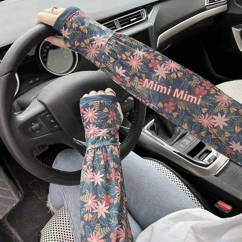Printed UV protection oversleeves in floral design with elasticated edges for arm coverage