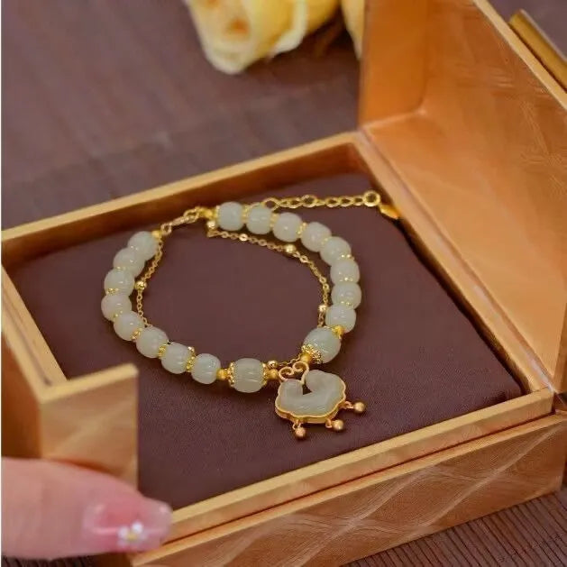 Green women's safety lock bell pendant bracelet with electroplated finish and drop-shaped charm