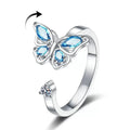 Adjustable butterfly ring in electroplated copper, available in white gold or yellow gold with blue or pink diamond finish