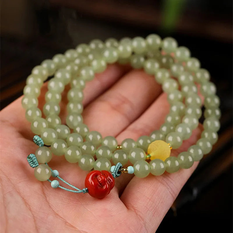Pale blue Hetian jade bracelet with three circle design measuring 6mm diameter