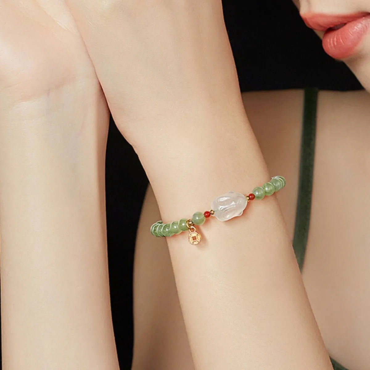 Handmade Hetian jade rabbit bracelet for women in glass, showing rabbit charm designs.