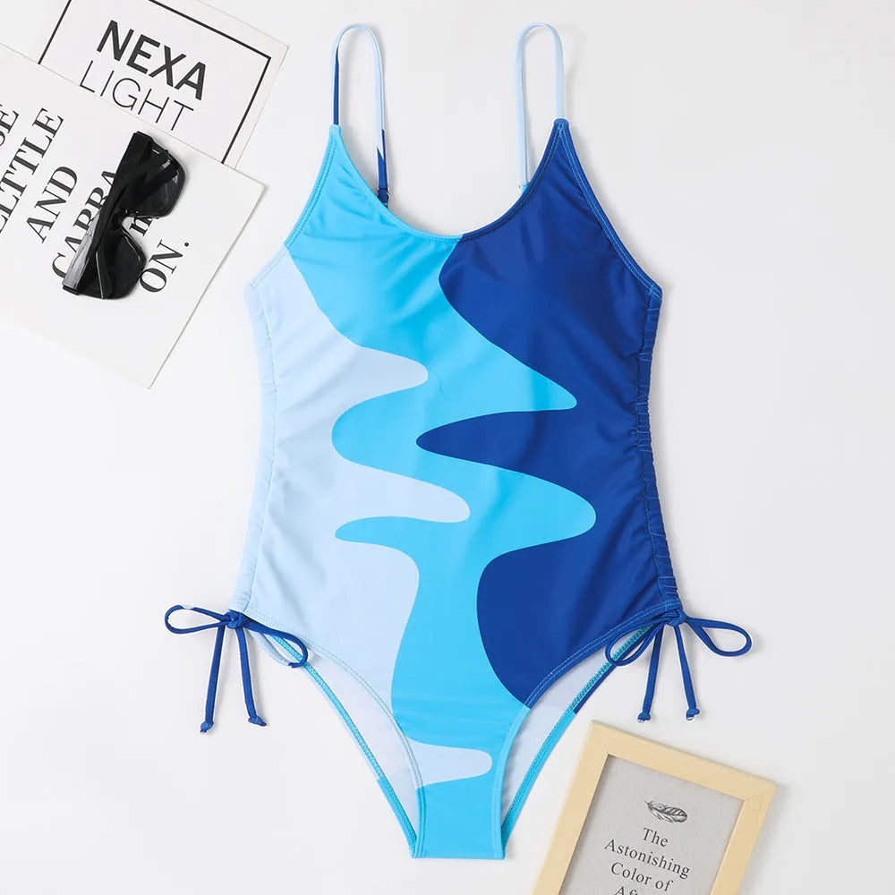 One-piece swimsuit in blue colour with sleeveless design and fixed swimming trunks for female swimming sports
