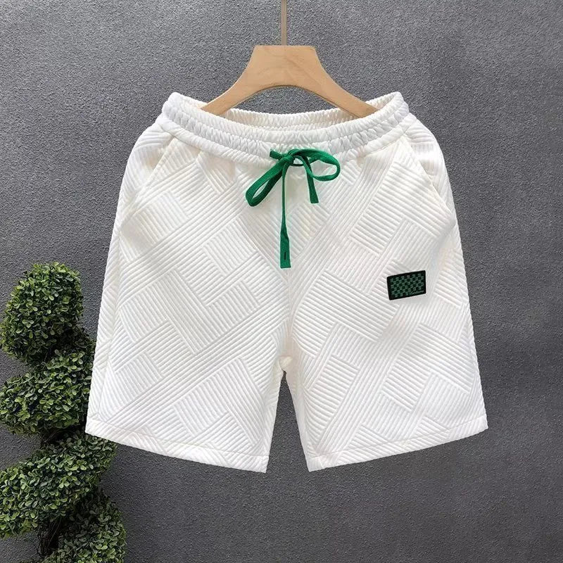 Casual sports shorts in solid colour with elastic waistband, suitable for active wear