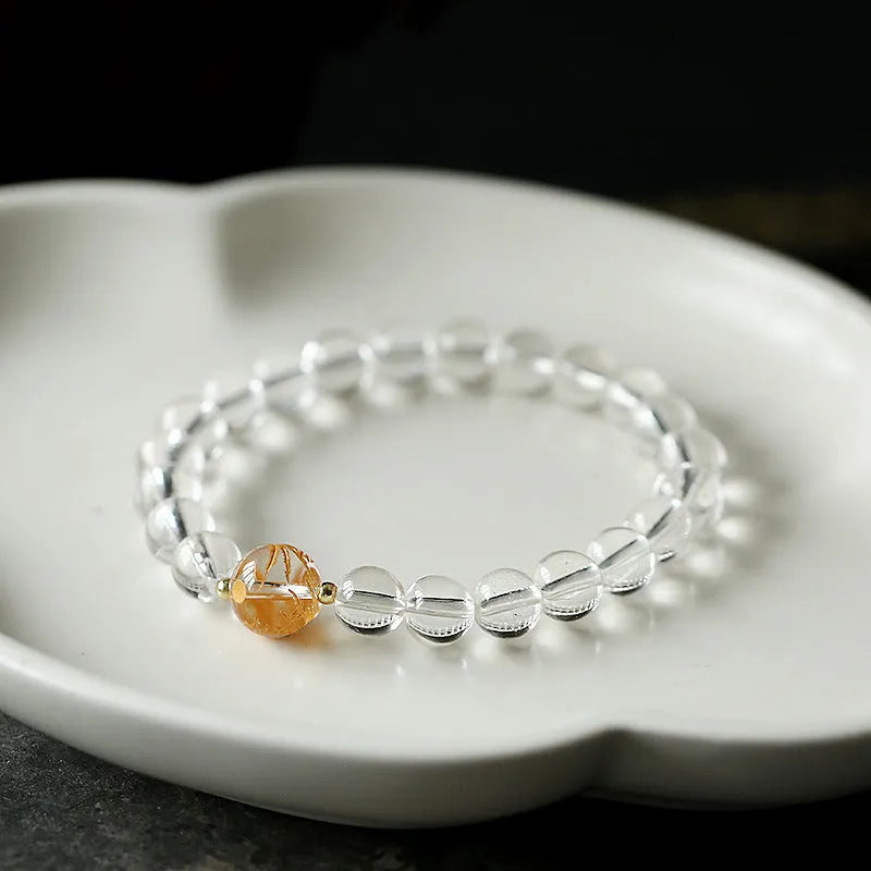 Unisex geometric obsidian and white crystal bracelet with black agate beads and golden dragon accent