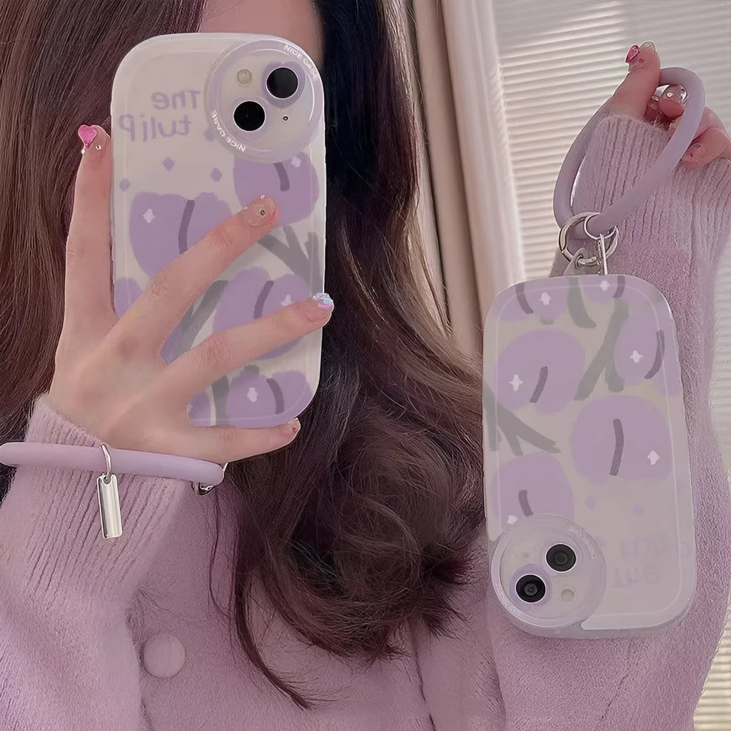 Purple tulip transparent iPhone case with heart-shaped camera detail and matching adjustable bracelet