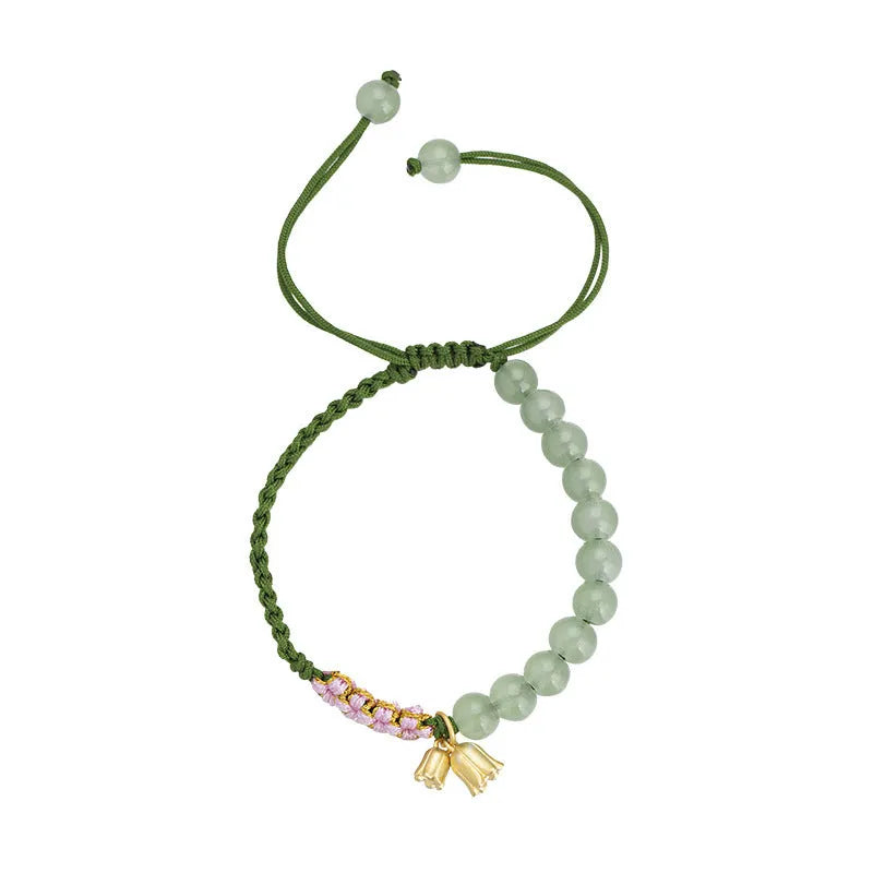 Red rope hand woven bracelet with lily flower design for women in national style
