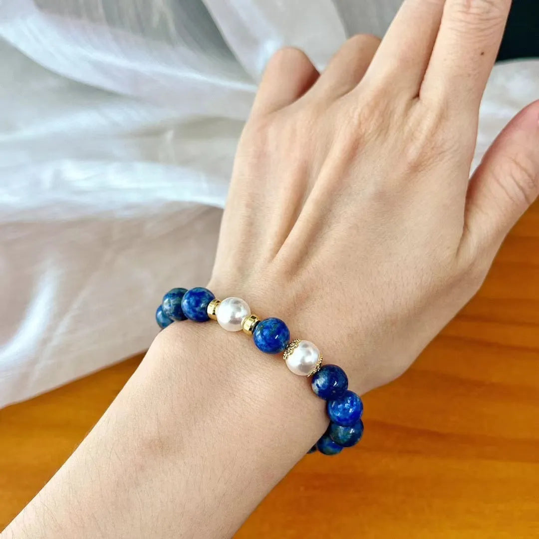 Chinese style artistic retro bracelet made with genuine blue and gold lapis lazuli beads.
