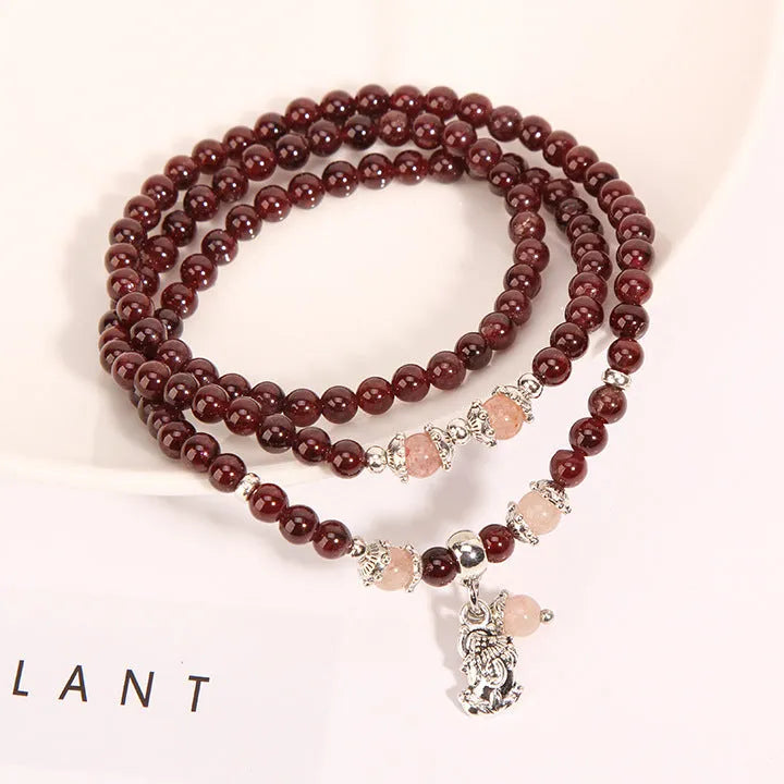 Wine red garnet crystal bracelet with floral design and bohemian style for women