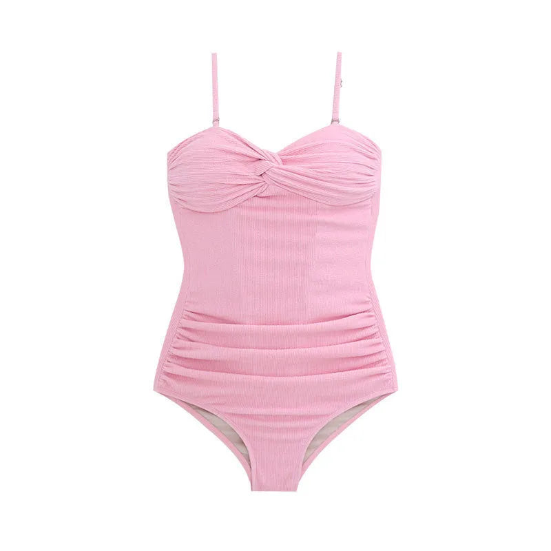 Women's black one-piece swimsuit with adjustable shoulder straps and high-waist design for swimming