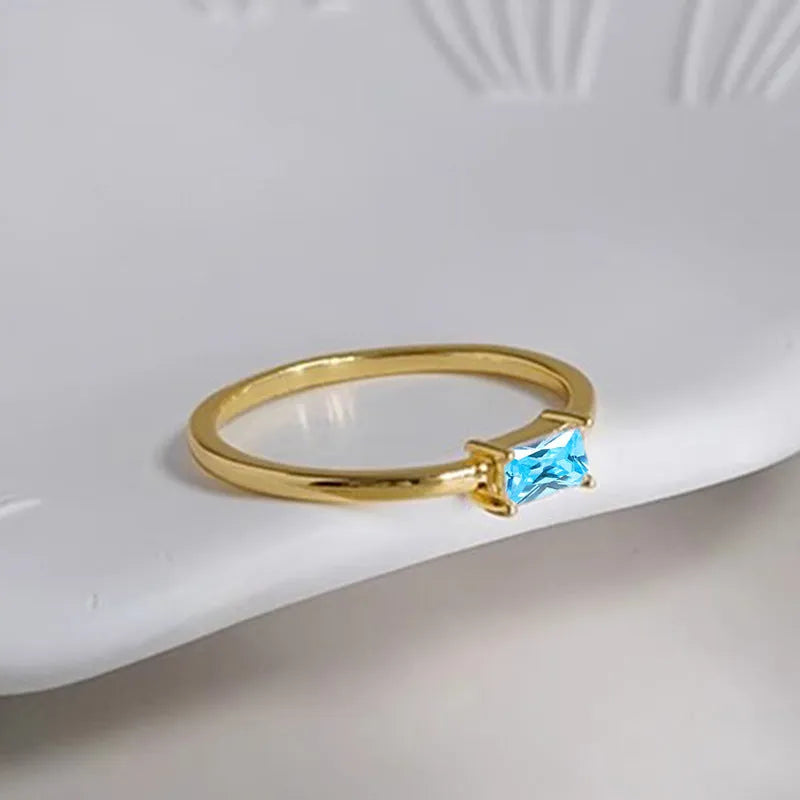 Sapphire blue zircon geometric bracelet ring with oval and love heart designs on copper base