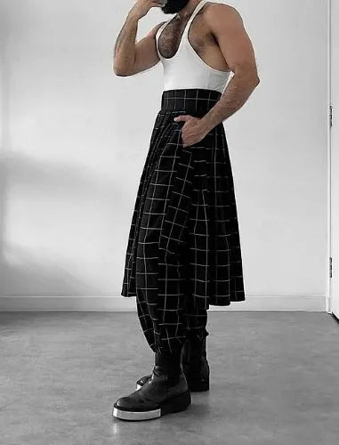 Men's plaid trousers featuring an apron-style front pocket panel in a tartan pattern.