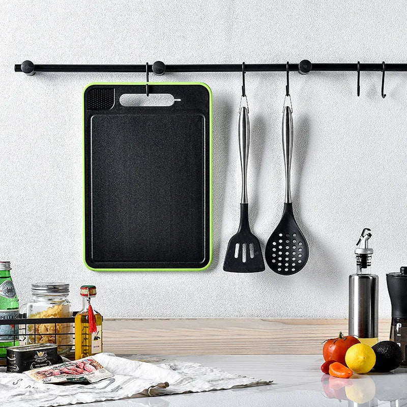 Grey square aluminium cutting board with double sides, grinding teeth, and integrated knife sharpener