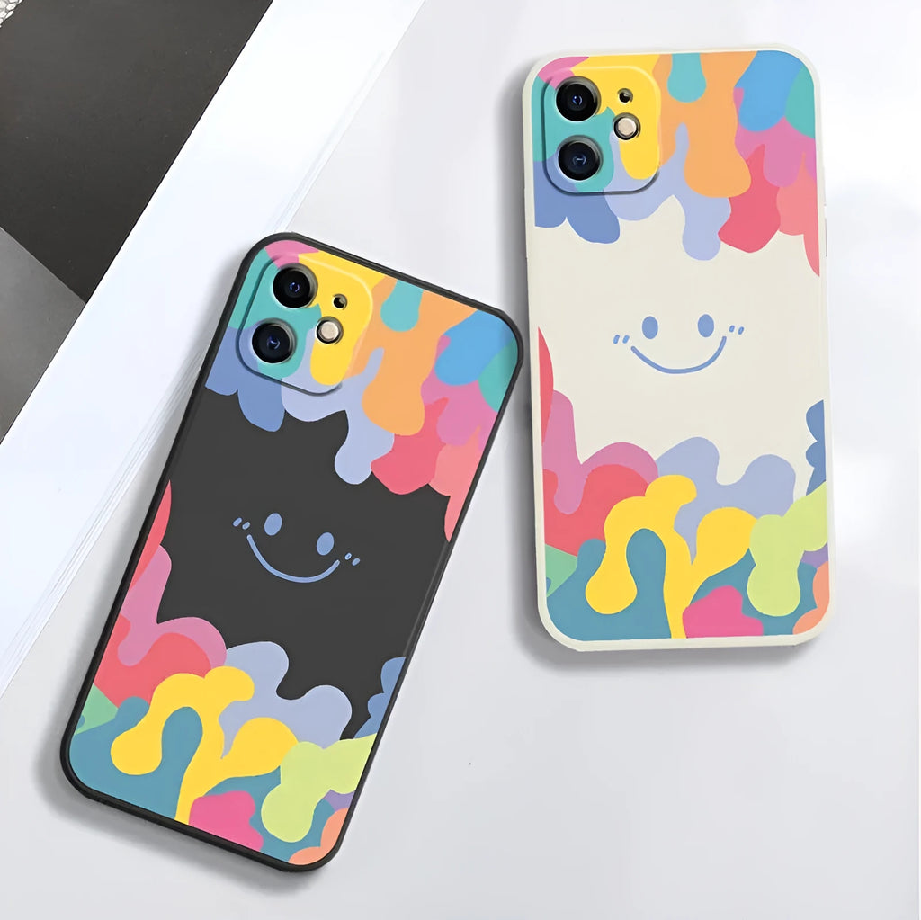 White TPU phone case with rainbow smiley face design and attached black lanyard for Apple iPhone.