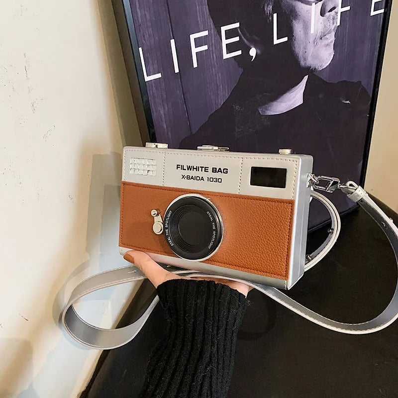 Soft PU leather mini crossbody camera bag in a horizontal square shape.