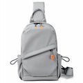 Black mens crossbody bag with adjustable strap showing waterproof polyester material