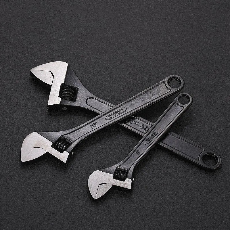 Stainless steel adjustable wrench with blackening treatment, ergonomic handle, and adjustable jaw for bolts up to 49mm