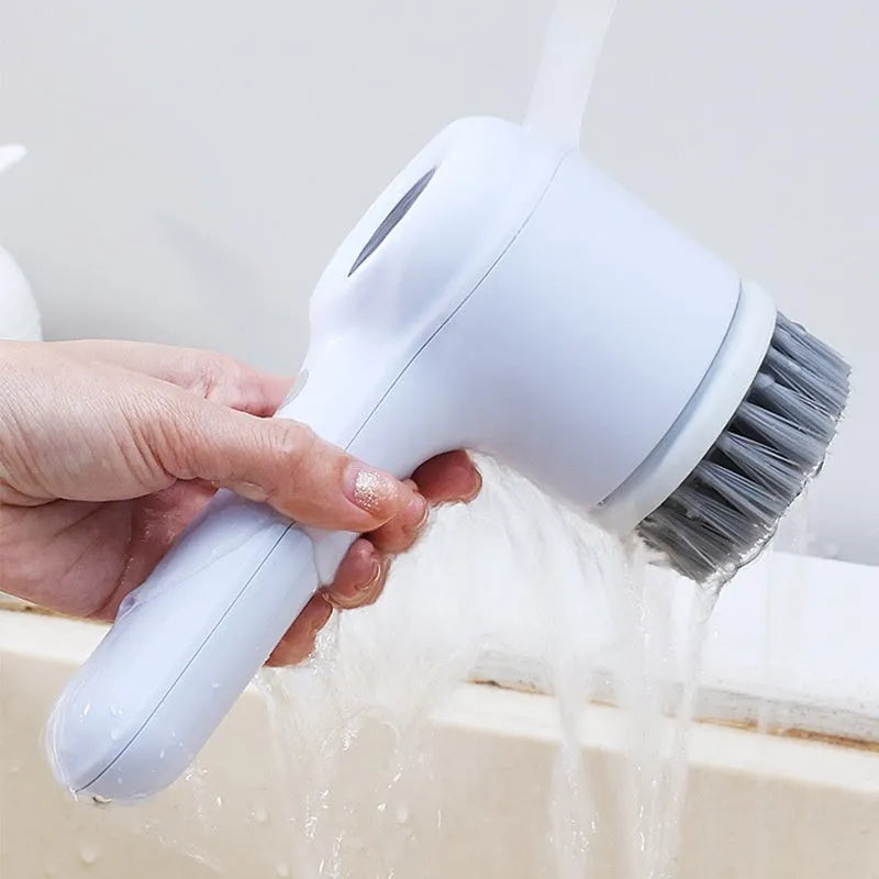 USB electric cleaning brush in light grey or purple with interchangeable cleaning heads for kitchen and household surfaces