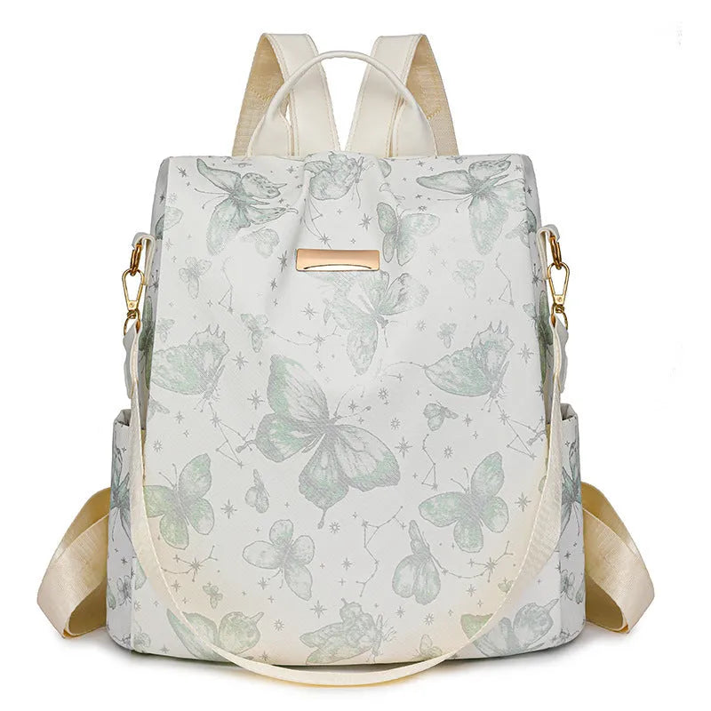Butterfly printed black PU leather backpack with visible sewing lines and a physiological curve backplate.