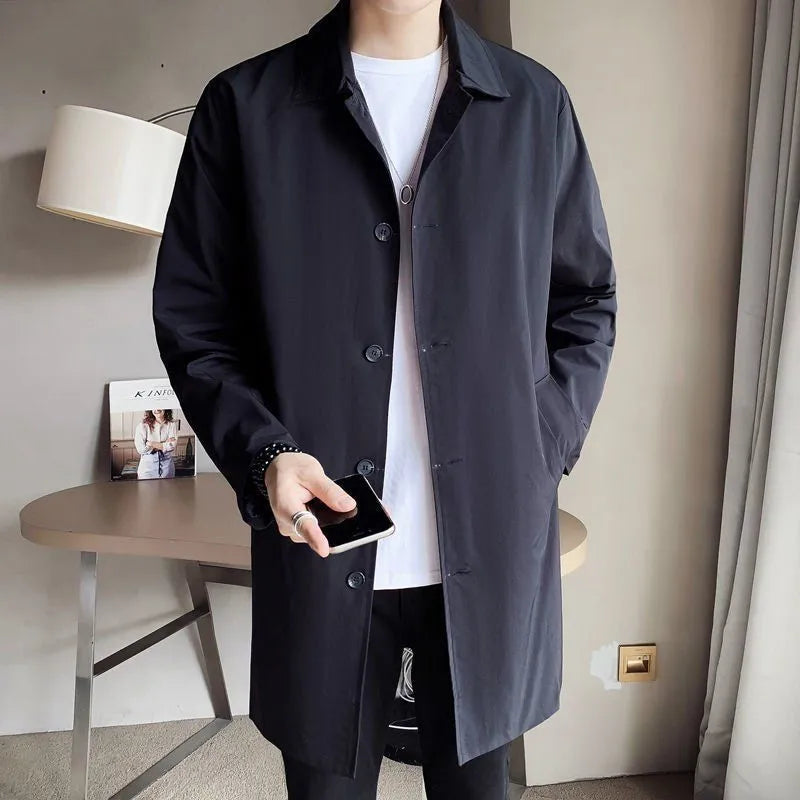 Men's khaki trench coat with loose casual fit and mid-length design