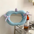 INS Korean-style wall mirror with aluminium lens and soft fabric frame in green apple colour.