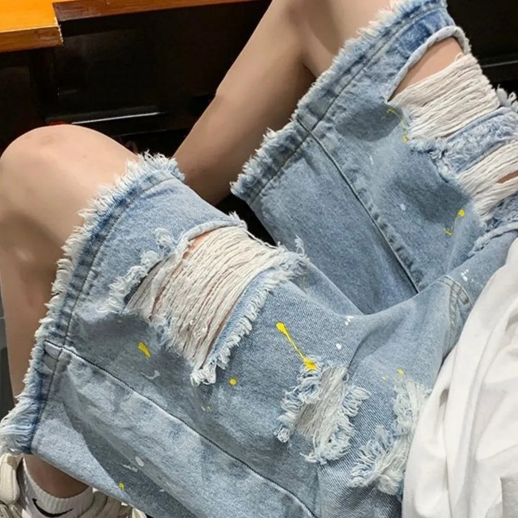 Men's loose fit water washed hole denim shorts in black and light blue colours, fifth pants length cut