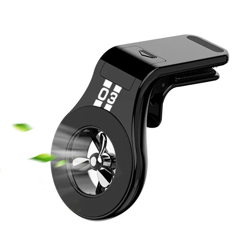 Magnetic car phone holder mounted on air vent with phone attached, showing 360-degree rotation and fragrance slices
