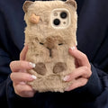 Brown flannel Capabala phone case with plush furry cartoon design for iPhone models
