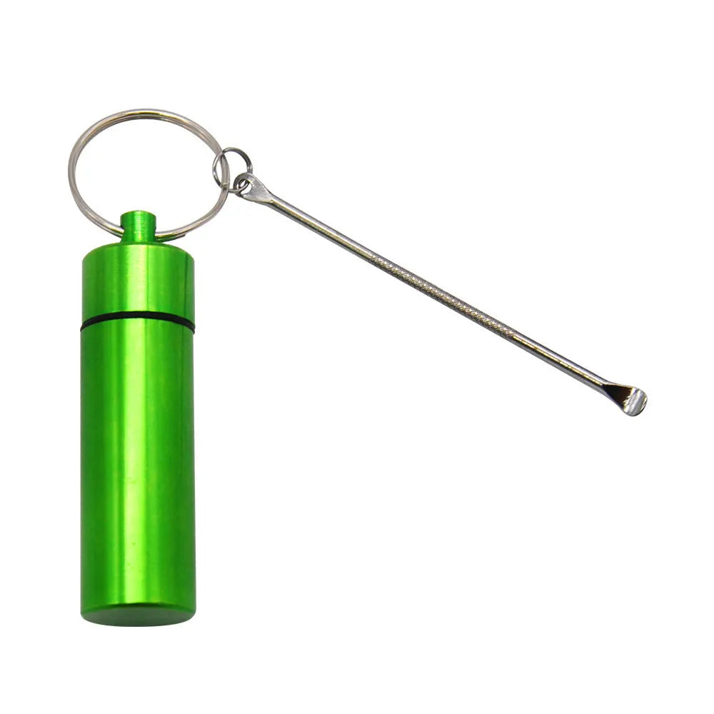 Blue aluminium portable pill box with attached spoon and keychain.