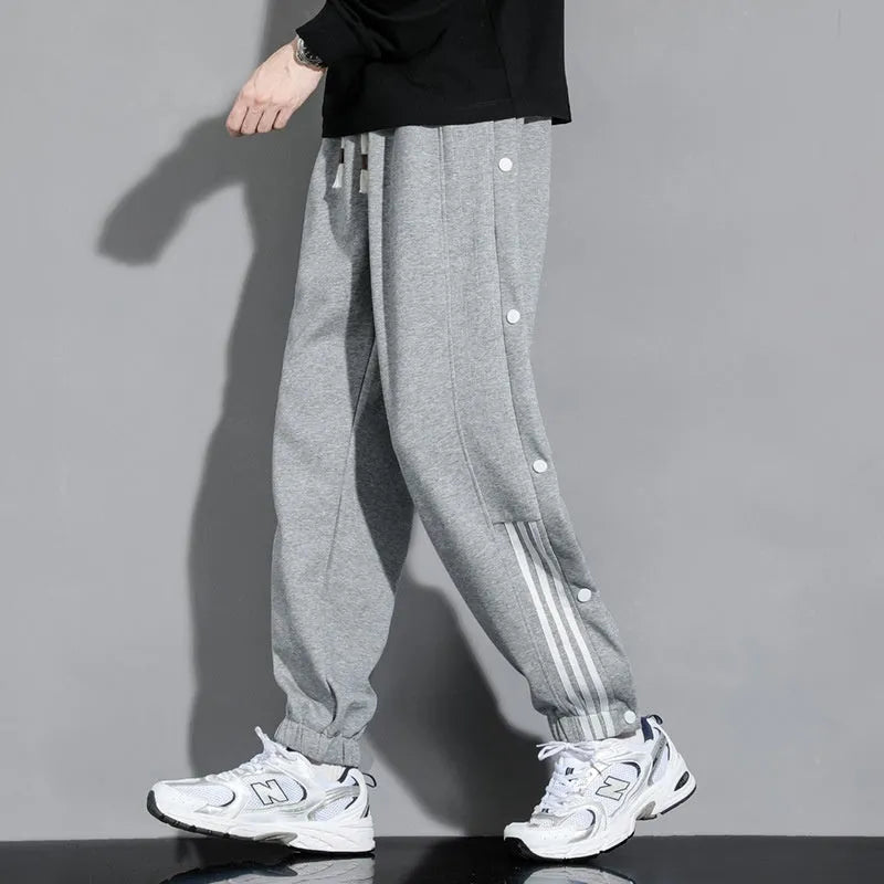 Men's ankle-tied sports pants in autumn colours with high waist and drawstring closure, sizes M to 6XL