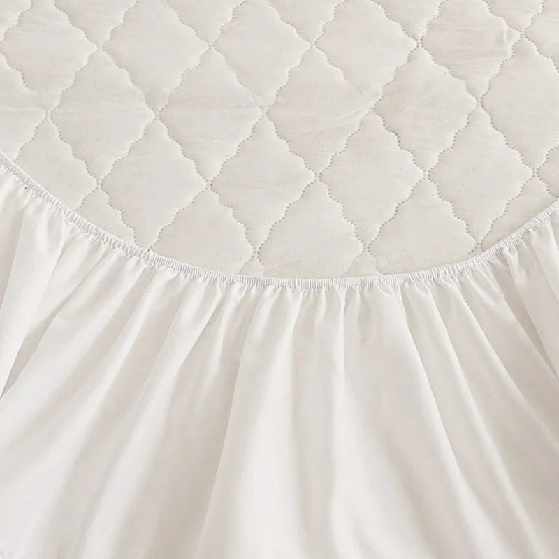 Diamond lattice quilted waterproof mattress protector set in black, grey, pink, or white with bamboo fibre material and fitted sheet sizes.