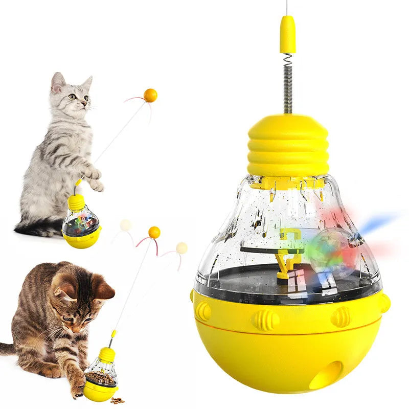 Pink interactive cat toy with tilting base, flexible teaser stick, and food dispenser compartment for indoor cats