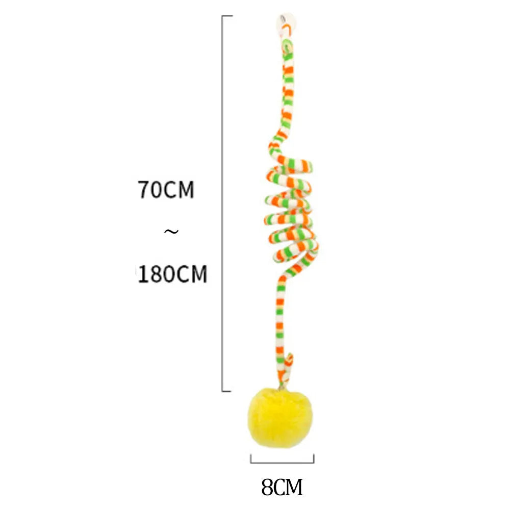 Kitten spring toy with blue inflatable ball hanging from suction cup on glass door