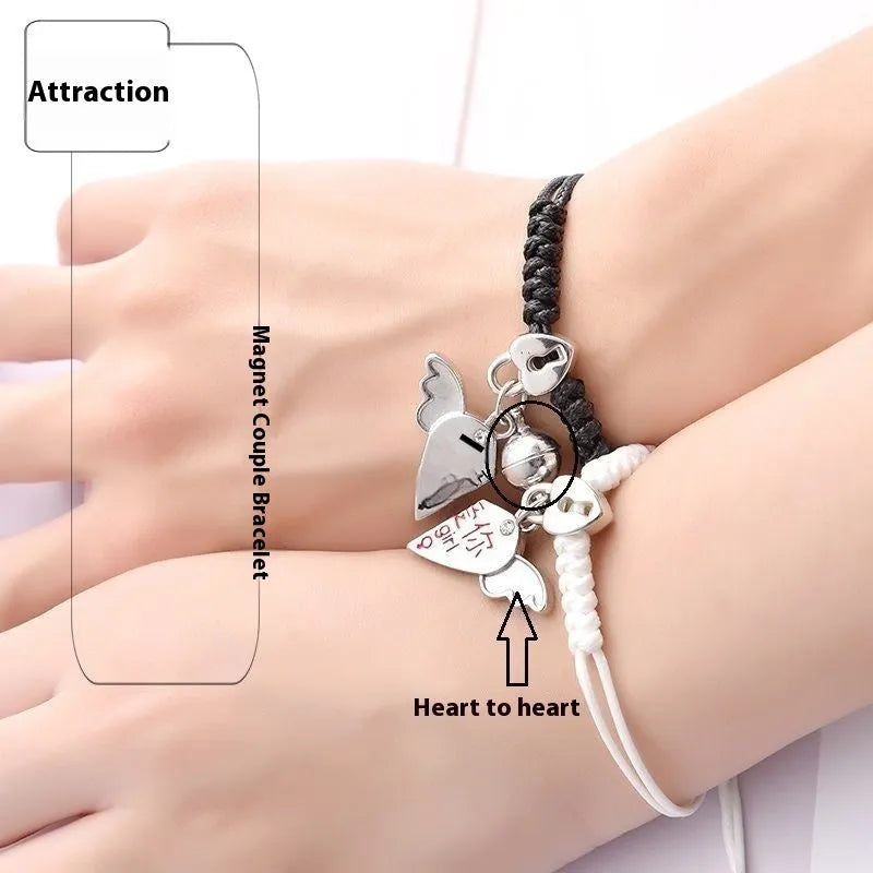 Pair of adjustable alloy bracelets with magnetic clasp showing detailed design of Crown and Clover styles