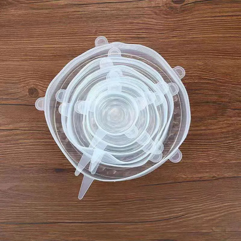 Set of six colourful silicone stretch lids in different sizes for covering food containers.