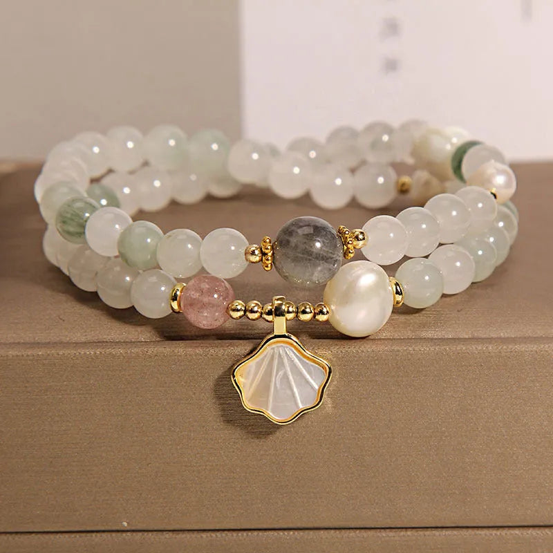 Crystal bracelet with Tianshan jade shell ginkgo leaf pendant and gold-plated gemstone settings