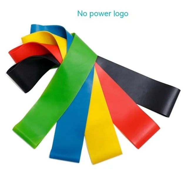 Five colour-coded TPE yoga tension straps with force marks arranged by thickness from 0.5mm to 1.1mm
