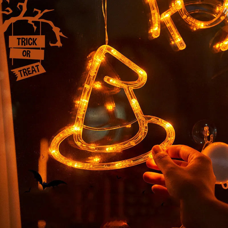 Halloween LED window lights set with spider, pumpkin and ghost designs on suction cups