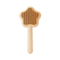 Green cat grooming comb with stainless steel needles and self-cleaning feature, 20cm length