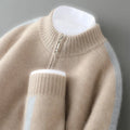Sheep wool sweater with half-height zip and round neck in slim fit, showing standard wool yarn texture