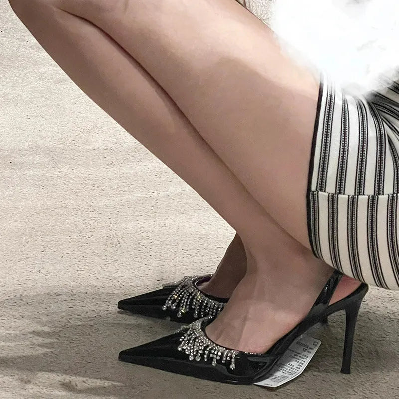 Black French tassel rhinestone slingback high heel sandals with a 10cm heel and pointed toe.