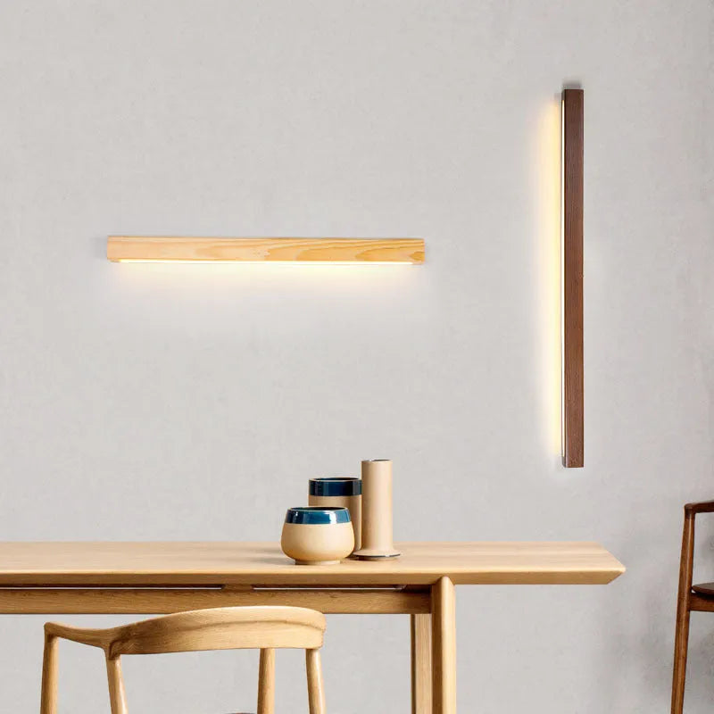 Walnut colour wooden strip wall lamp with LED lighting in minimalist rectangular design