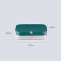 Green minimalist multi-layer jewellery storage box with lid open, showing internal compartments.