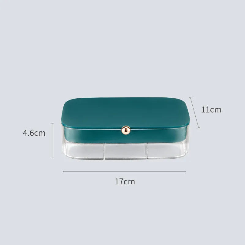 Green minimalist multi-layer jewellery storage box with lid open, showing internal compartments.