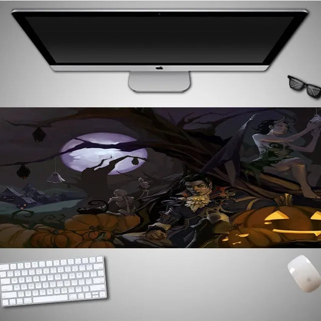 Oversized Halloween-themed mouse pad on desk with non-slip rubber cloth base and large surface area