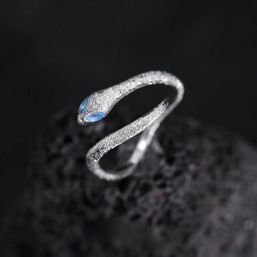 Adjustable silver snake ring with electroplated platinum colour finish and detailed scale texture