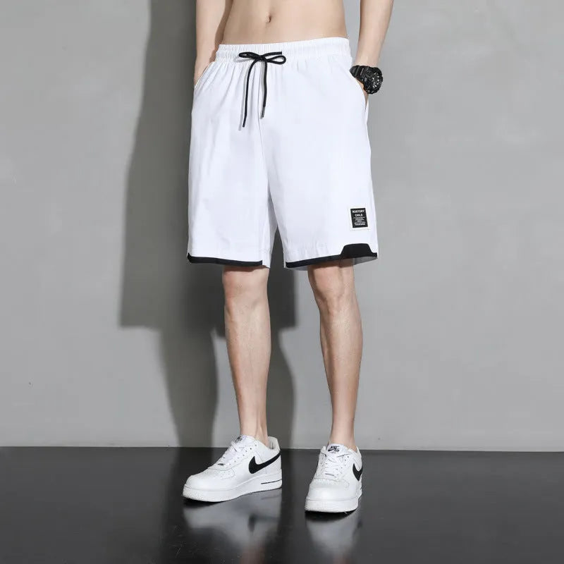 Cotton shorts for boys in black, khaki, or white with mid-waist design and shorts length