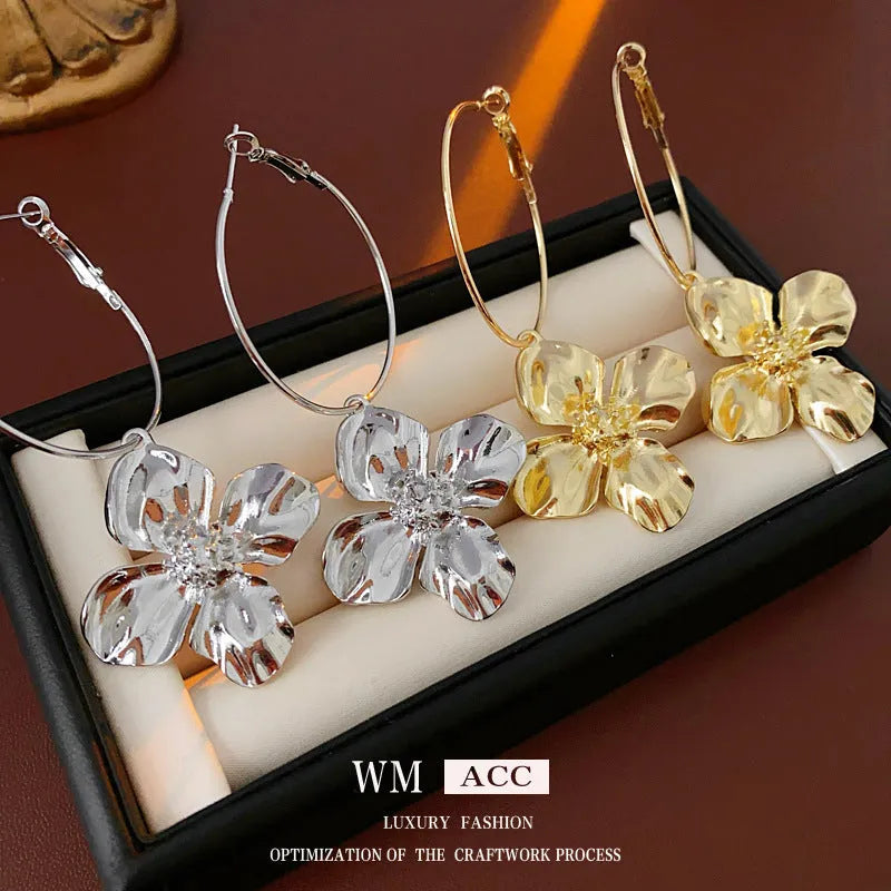 Silver needle metal flower earrings with electroplated gold or silver finish and vintage design