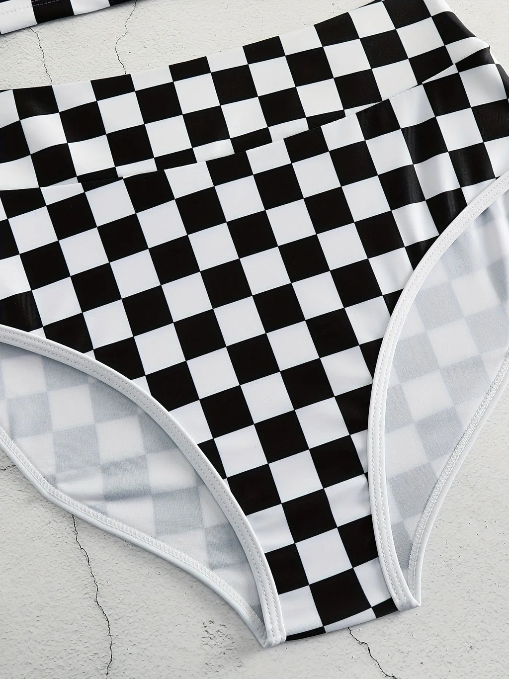 Women's check pattern racing swimsuit with backless suspender design in polyester fabric