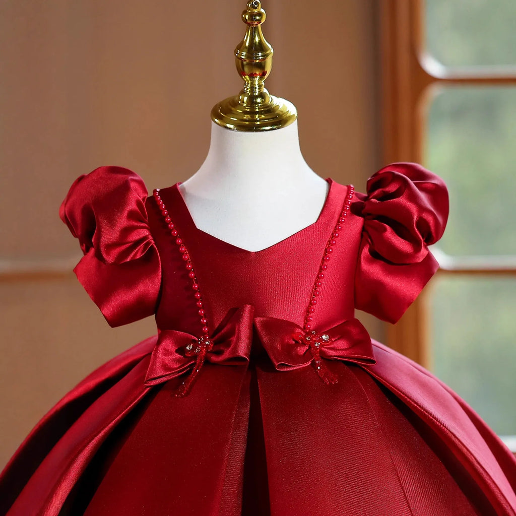 Girls wine red polyester princess party dress for birthdays and evening events, available in 80cm to 150cm height sizes.