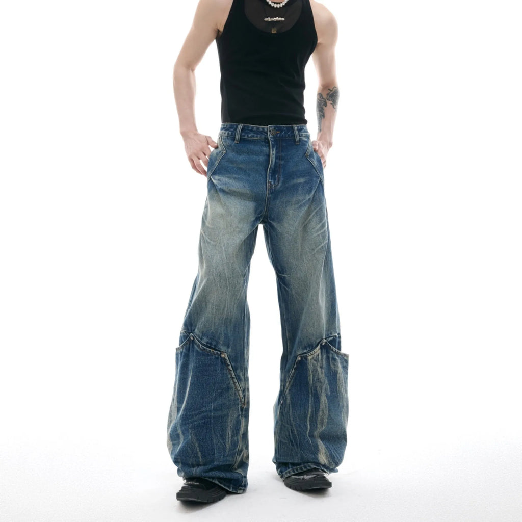 Men's verdant blue jeans with washed burst pattern and curved knife detailing, loose fit design